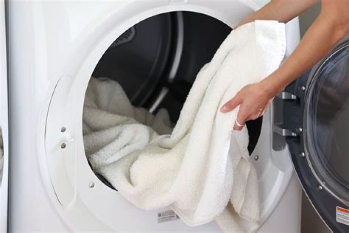 Should towels be washed in hot or cold water?