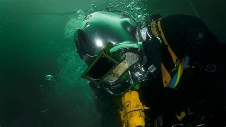 What do divers rub on their legs?