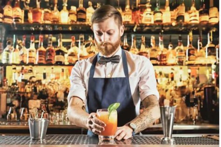 Why do bartenders carve ice?