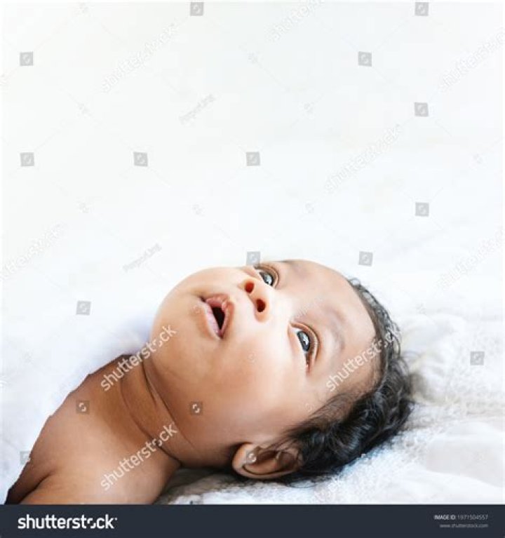Why does my baby keep looking up at the ceiling?